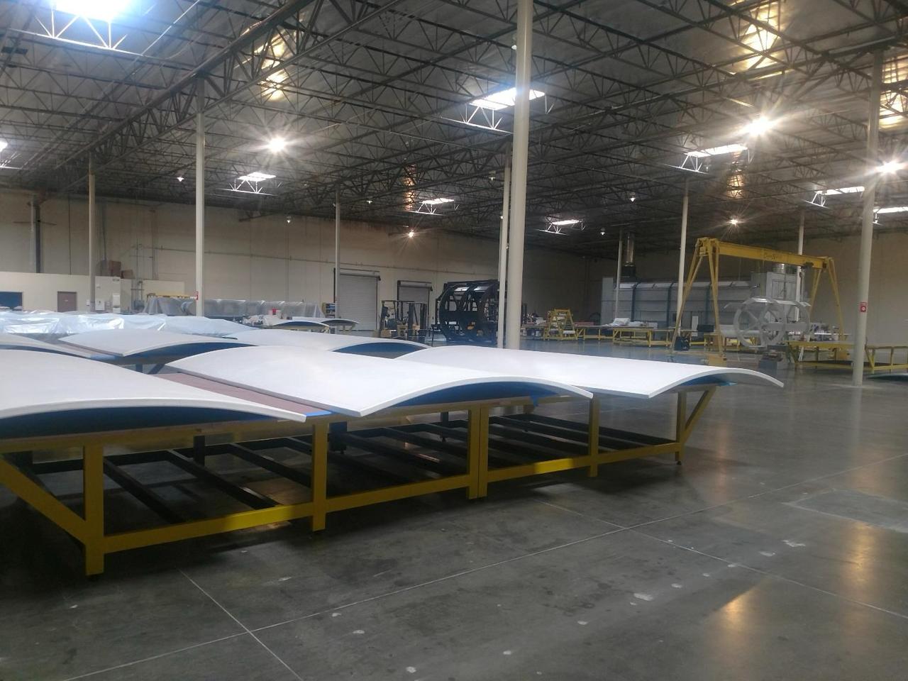 Composite panel manufacturing facility